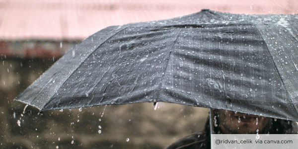 Man under and umbrella in the rain (2)